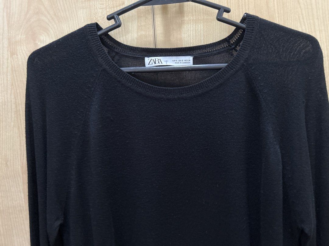 Zara Black Long Sleeve Sweater Top (Category: Longsleeves) located in Manila. Submitted by tprdo09 (Listing ID 1445500142, Image 2). Description: - Brand: Zara - Color: Black - Style: Long sleeve, crew neck sweater - Design: Simple and classic - Versatility: Great for layering or wearing alone - Origin: Made in Cambodia - Size: S.