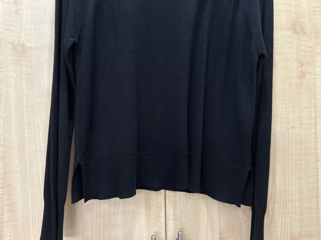 Zara Black Long Sleeve Sweater Top (Category: Longsleeves) located in Manila. Submitted by tprdo09 (Listing ID 1445500142, Image 3). Description: - Brand: Zara - Color: Black - Style: Long sleeve, crew neck sweater - Design: Simple and classic - Versatility: Great for layering or wearing alone - Origin: Made in Cambodia - Size: S.