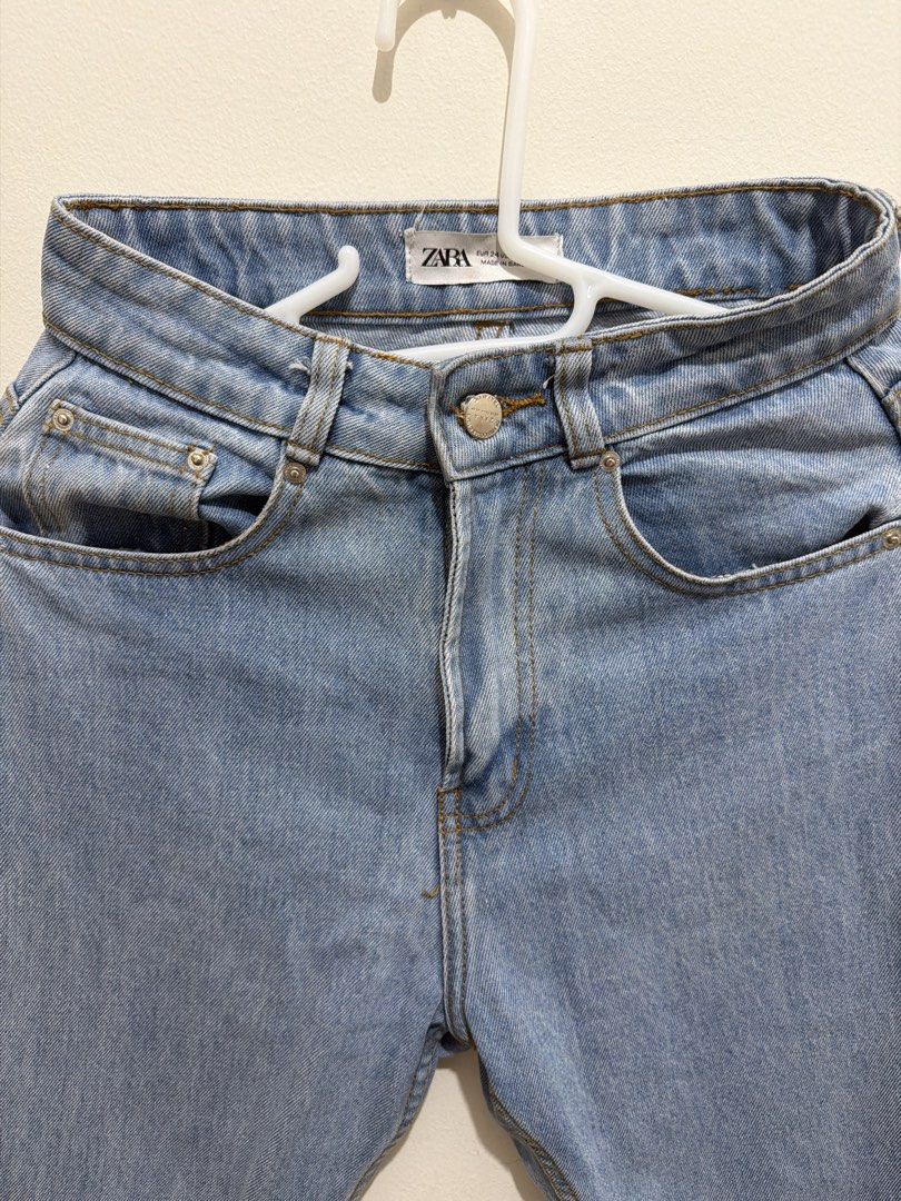 ZARA Light Wash Mom Jeans (Category: Jeans) located in Pasay City. Submitted by petiteprelovecloset (Listing ID 1445591973, Image 2). Description: - ZARA light wash mom jeans - High-waisted fit - Classic five-pocket styling - Button and zip fly closure - Size: EUR 24 / USA 24 - Perfect staple piece, easy to style -Zara Mom jeans -Thick Denim -Light washed jeans -Zara denim.