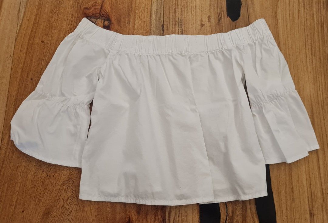 6ixty8ight Off-Shoulder Bell Sleeve Top (Category: Blouses) located in Cavite. Submitted by helpusdeclutter (Listing ID 1445628852, Image 1). Description: 6ixty8ight Off Shoulder Bell Sleeve Top Store bought in Taiwan. In great condition. Color White Size Small Selling for P400 only. Comfortable elasticated neckline Flowy bell sleeves with gathered detail Versatile: pairs well with jeans or shorts Ideal for casual day or night wear Simple and chi