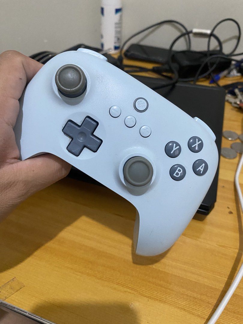 8BitDo Pro 2 Bluetooth Game Controller (Category: Controllers) located in Mabalacat. Submitted by ednavealenjohn (Listing ID 1445692422, Image 3). Description: - Light blue 8BitDo Pro 2 Controller - Compatible with multiple platforms - USB-C charging for convenience - Responsive buttons and smooth joysticks - Perfect for gaming at home or on the go.