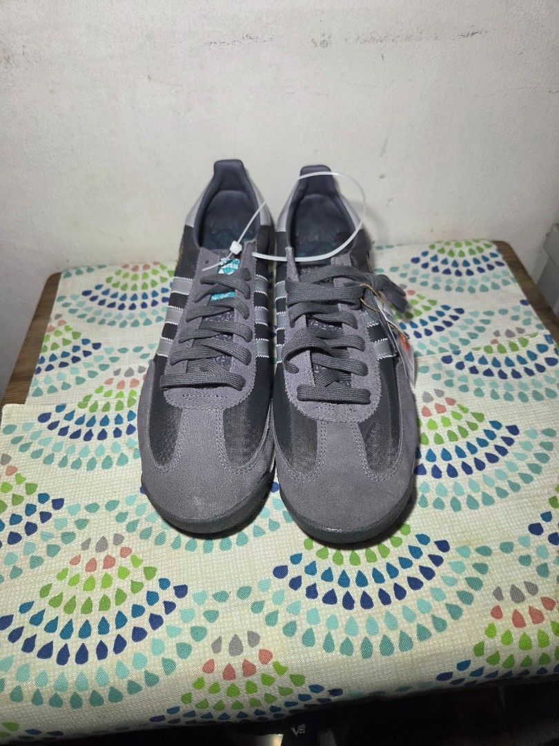 Adidas SL 72 Grey Silver Men's Sneakers (Category: Sneakers) located in Las Pinas. Submitted by milo0502 (Listing ID 1445771032, Image 2). Description: - Classic Adidas SL 72 sneakers - Grey suede and mesh upper - Iconic silver stripes - Teal accent on the midsole - Durable gum sole for excellent grip - Brand new with original tags attached - Ideal for casual and everyday wear -No Box.