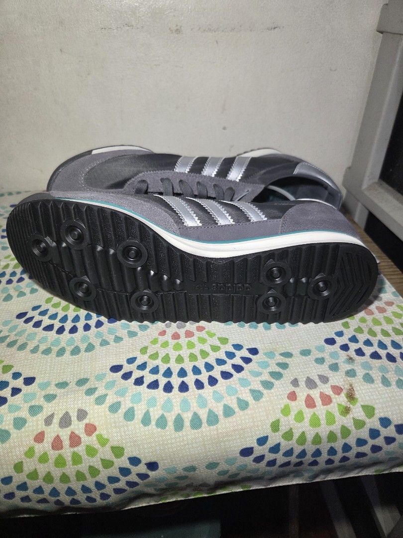Adidas SL 72 Grey Silver Men's Sneakers (Category: Sneakers) located in Las Pinas. Submitted by milo0502 (Listing ID 1445771032, Image 3). Description: - Classic Adidas SL 72 sneakers - Grey suede and mesh upper - Iconic silver stripes - Teal accent on the midsole - Durable gum sole for excellent grip - Brand new with original tags attached - Ideal for casual and everyday wear -No Box.