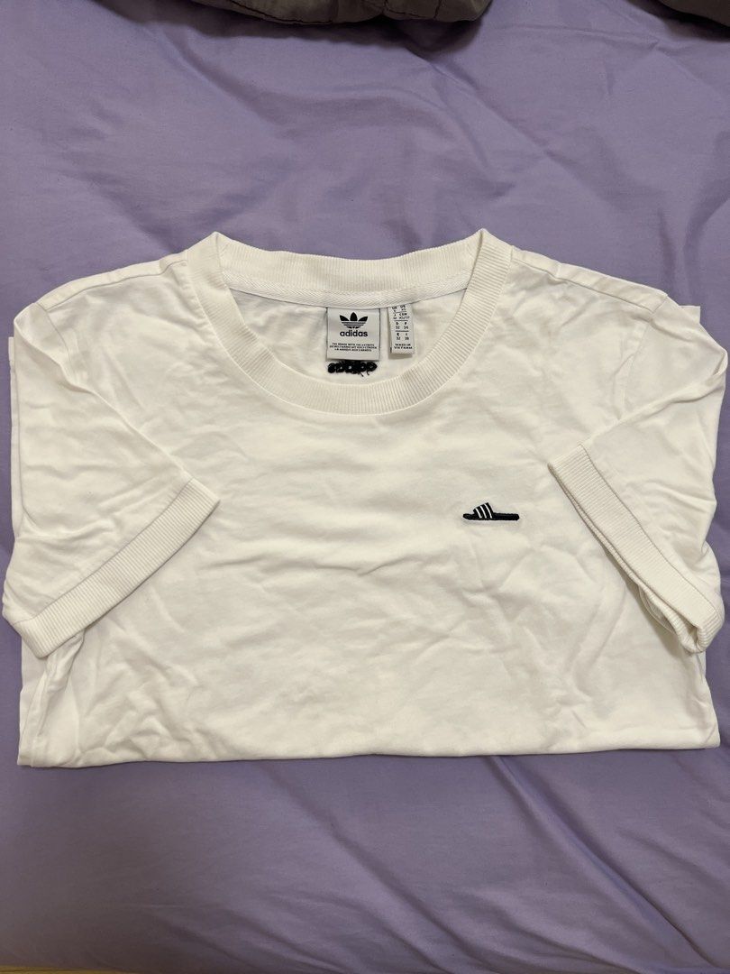 Adidas White T-shirt with Small Logo (Category: Shirts) located in Quezon City. Submitted by rheisells_ (Listing ID 1445672802, Image 1). Description: .