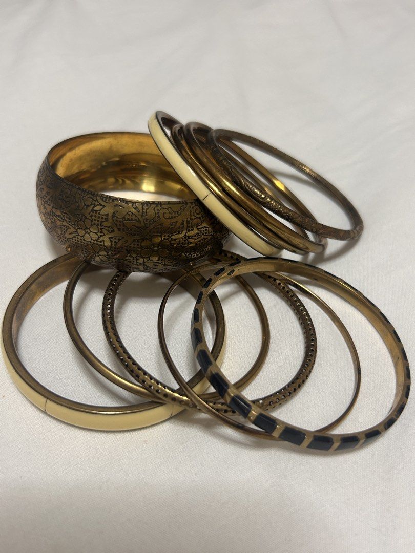 Assorted Bangle Bracelets Set (Category: Bracelets) located in Singapore. Submitted by aicaram (Listing ID 1445752855, Image 1). Description: - Assorted bangle bundle size XS for small wrist ladies - Authentic DIVA brand - Includes wide engraved gold cuff - Cream ,gold , silver bangles - Thinner patterned bangles - Ideal for stacking and mixing - Adds a bohemian/eclectic vibe - Bundle deal for all items - $2 for thin bangle -$6 for wide bangle - 
