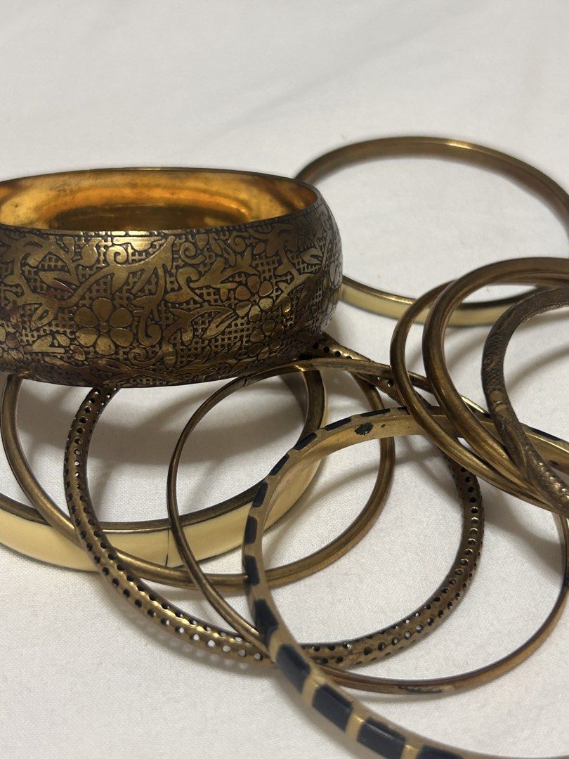 Assorted Bangle Bracelets Set (Category: Bracelets) located in Singapore. Submitted by aicaram (Listing ID 1445752855, Image 2). Description: - Assorted bangle bundle size XS for small wrist ladies - Authentic DIVA brand - Includes wide engraved gold cuff - Cream ,gold , silver bangles - Thinner patterned bangles - Ideal for stacking and mixing - Adds a bohemian/eclectic vibe - Bundle deal for all items - $2 for thin bangle -$6 for wide bangle - 