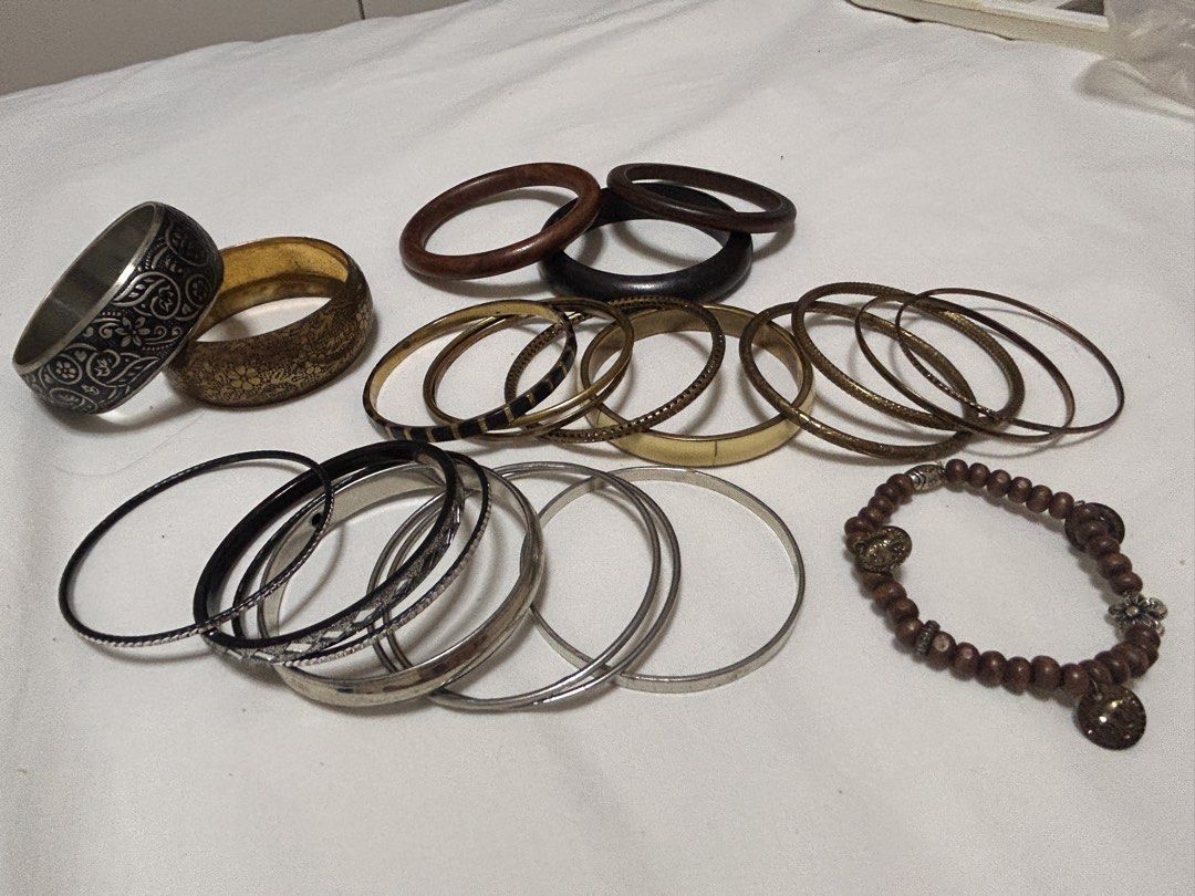 Assorted Bangle Bracelets Set (Category: Bracelets) located in Singapore. Submitted by aicaram (Listing ID 1445752855, Image 3). Description: - Assorted bangle bundle size XS for small wrist ladies - Authentic DIVA brand - Includes wide engraved gold cuff - Cream ,gold , silver bangles - Thinner patterned bangles - Ideal for stacking and mixing - Adds a bohemian/eclectic vibe - Bundle deal for all items - $2 for thin bangle -$6 for wide bangle - 