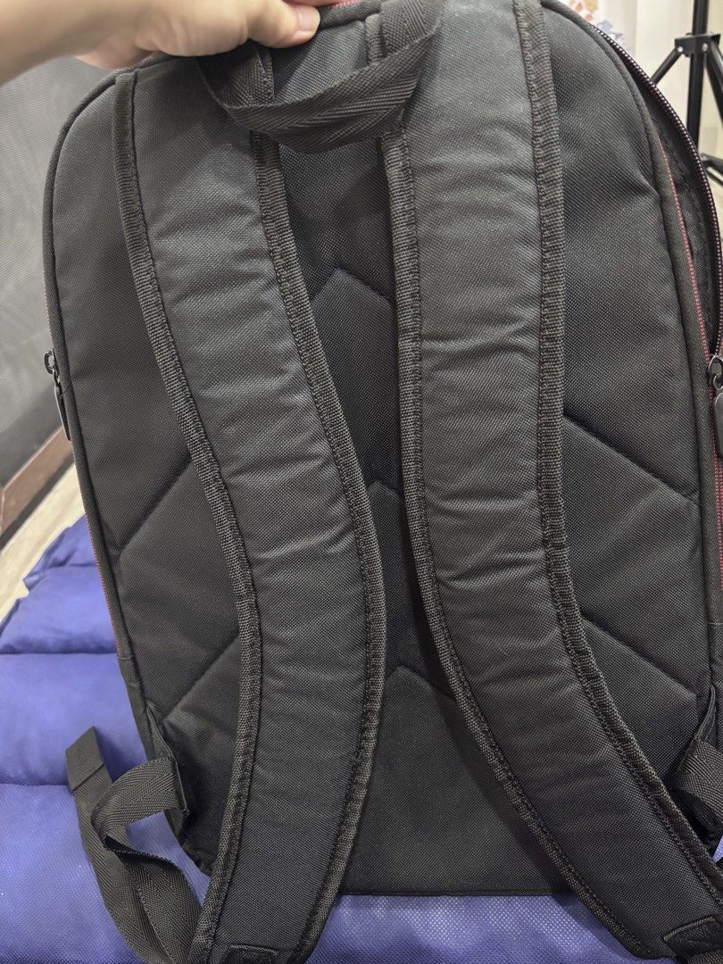 ASUS "Nereus" Backpack (Category: Backpacks) located in Quezon City. Submitted by foreverj.ph (Listing ID 1445648130, Image 3). Description: - Brand new ASUS backpack - Features a stylish pink accent line - Made from lightweight polyester material (0.5kg) - Ideal for carrying laptops and daily essentials - Comes with original tags attached.