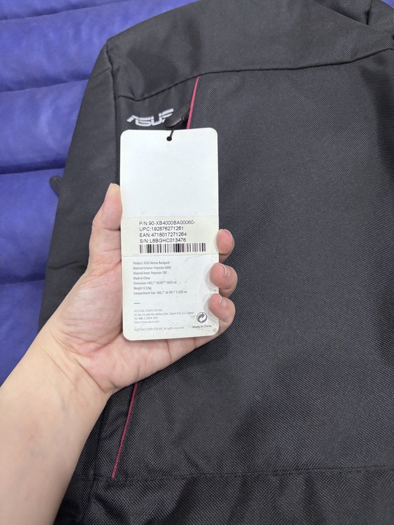 ASUS "Nereus" Backpack (Category: Backpacks) located in Quezon City. Submitted by foreverj.ph (Listing ID 1445648130, Image 2). Description: - Brand new ASUS backpack - Features a stylish pink accent line - Made from lightweight polyester material (0.5kg) - Ideal for carrying laptops and daily essentials - Comes with original tags attached.