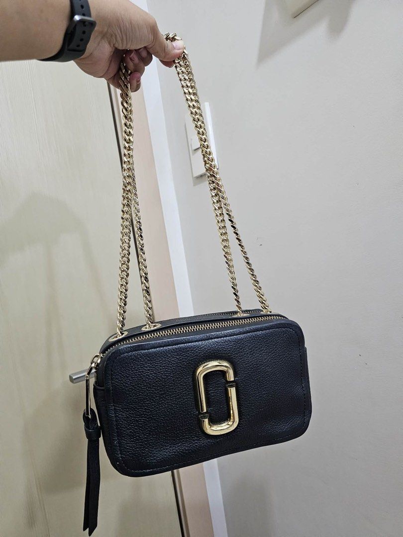 Authentic MJ snapshot (Category: Cross-body Bags) located in Quezon City. Submitted by MsCLM (Listing ID 1445740991, Image 1). Description: 💯Authentic With carecard, dustbag and paper bag Selling very low pls dont haggle. Bought this 18k. .