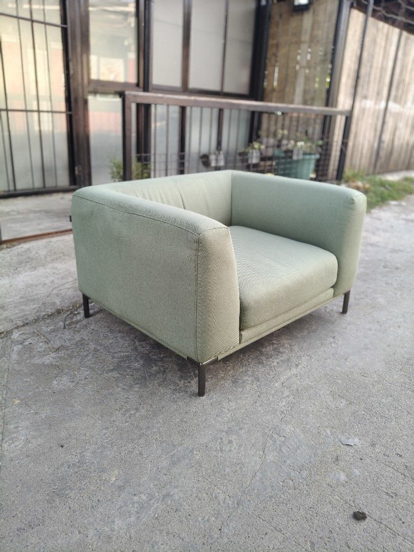 Big and bulky green single seater sofa (Category: Chairs) located in Cavite. Submitted by yourownspace.tgyty (Listing ID 1445613449, Image 2). Description: Big bulky green armchair sofra with soft foam and fabric, and chrome legs this is very wide and deep, not for small spaces. this is more green in person. the light made the color look more flat in the photos. no issues, like new! will be deep cleaned before sending out brand is Fursys and reta