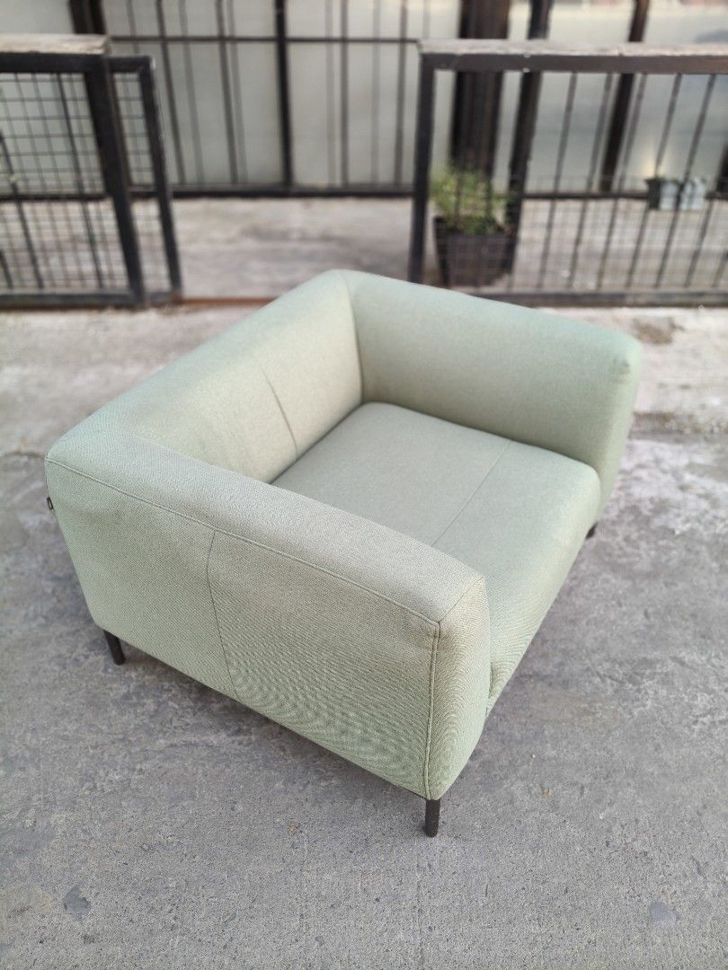 Big and bulky green single seater sofa (Category: Chairs) located in Cavite. Submitted by yourownspace.tgyty (Listing ID 1445613449, Image 3). Description: Big bulky green armchair sofra with soft foam and fabric, and chrome legs this is very wide and deep, not for small spaces. this is more green in person. the light made the color look more flat in the photos. no issues, like new! will be deep cleaned before sending out brand is Fursys and reta