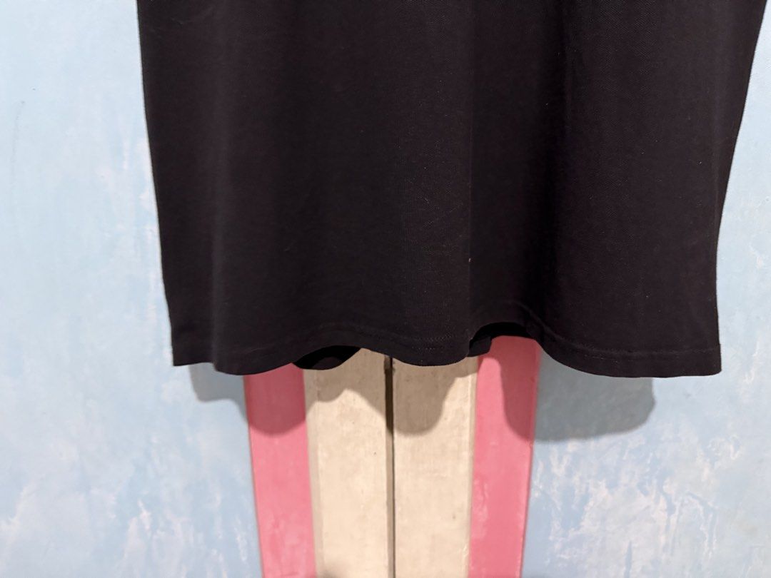 Black Dress with White Peter Pan Collar (Category: Dresses) located in Manila. Submitted by prelovedbyshai_116 (Listing ID 1445631091, Image 3). Description: - Classic black short-sleeved dress - Features a large white pleated Peter Pan collar - Two buttons at the neckline - Simple and versatile design - Great for casual wear or layering - Easy to style up or down -Fits medium.