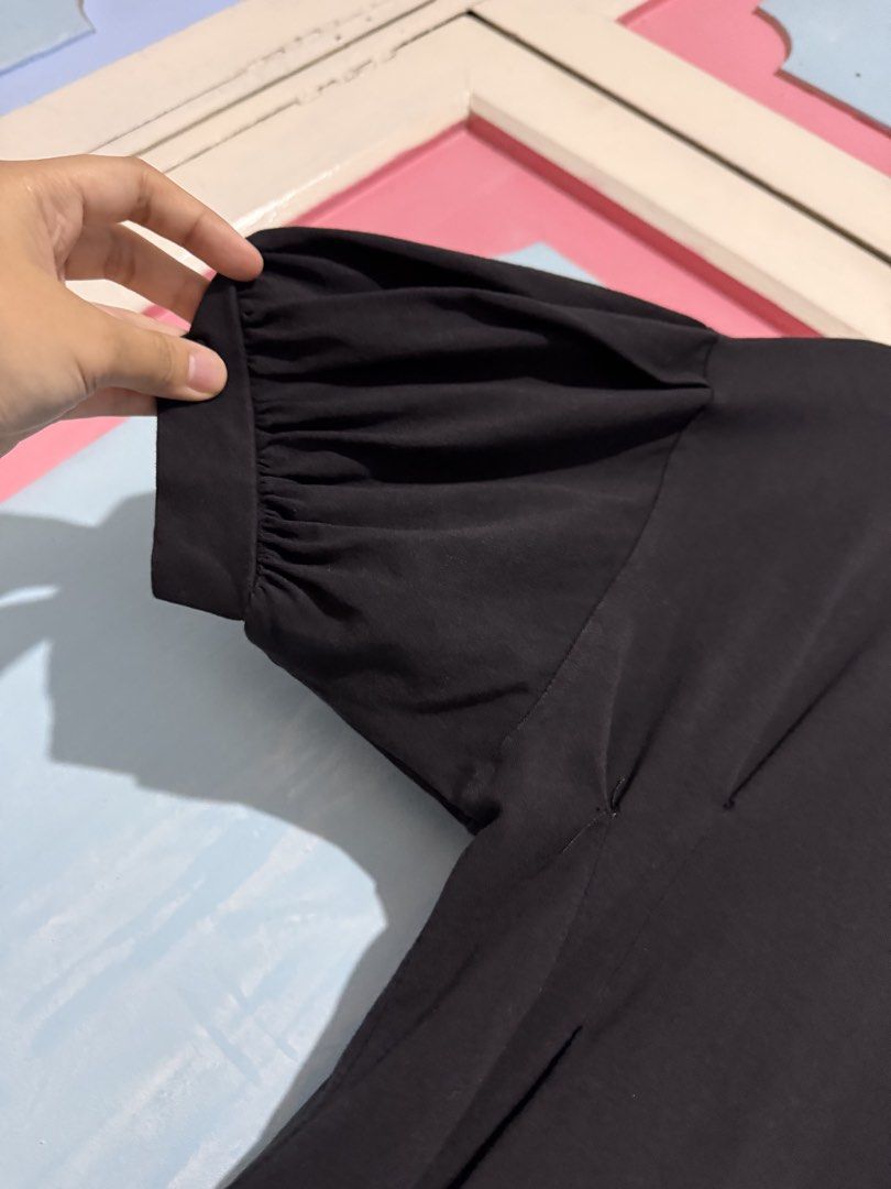 Black Puff Sleeve A-Line Mini Dress (Category: Dresses) located in Manila. Submitted by prelovedbyshai_116 (Listing ID 1445631231, Image 2). Description: - Black mini dress - Flattering A-line cut - Puff sleeves (gathered) - Soft and comfortable fabric - Versatile: great for casual outings or dressing up - Easy to style with sneakers or heels - Simple and chic design -Fits small.