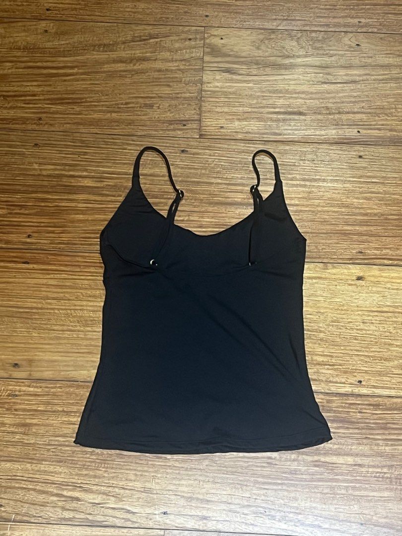 Black Tank Top w Built-in Bra (Category: Sleeveless) located in Pasig City. Submitted by tiny_studios (Listing ID 1445702260, Image 3). Description: - Cotton on XXS - looks like Tankair halter top - no flaws! still new - rfs: not my style anymore.