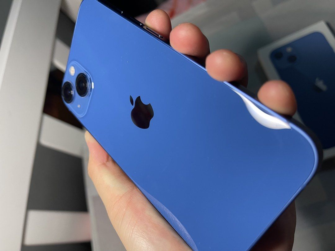Blue iPhone 13 - 91% BH with minimal scratches (Category: iPhone 13 Series) located in Paranaque City. Submitted by chengfinds (Listing ID 1445619702, Image 2). Description: FIXED PRICE -Lady owned - Comes with free cases, box, powermac paperbag, and original charger cord (used) - Bought in July 2024 IMPORTANT: - LCD has tiny scratches but it’s still smooth and it doesn’t affect the performance - May chipped na part but macocover siya with a case