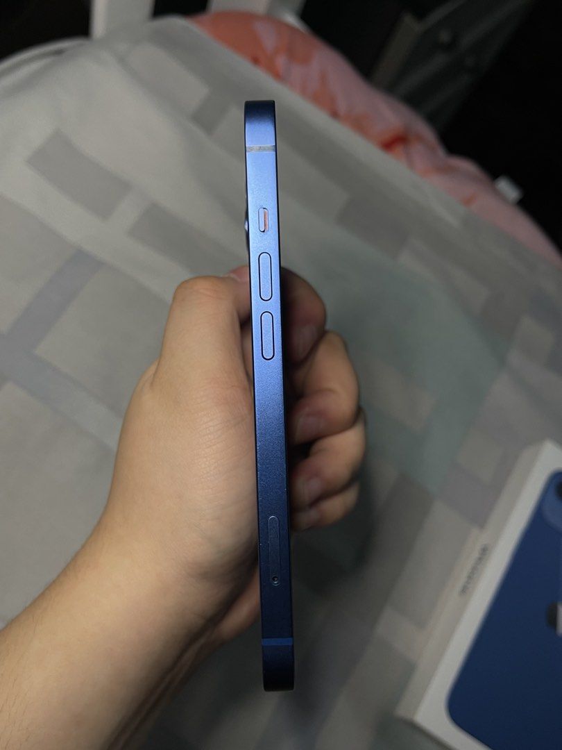 Blue iPhone 13 - 91% BH with minimal scratches (Category: iPhone 13 Series) located in Paranaque City. Submitted by chengfinds (Listing ID 1445619702, Image 3). Description: FIXED PRICE -Lady owned - Comes with free cases, box, powermac paperbag, and original charger cord (used) - Bought in July 2024 IMPORTANT: - LCD has tiny scratches but it’s still smooth and it doesn’t affect the performance - May chipped na part but macocover siya with a case