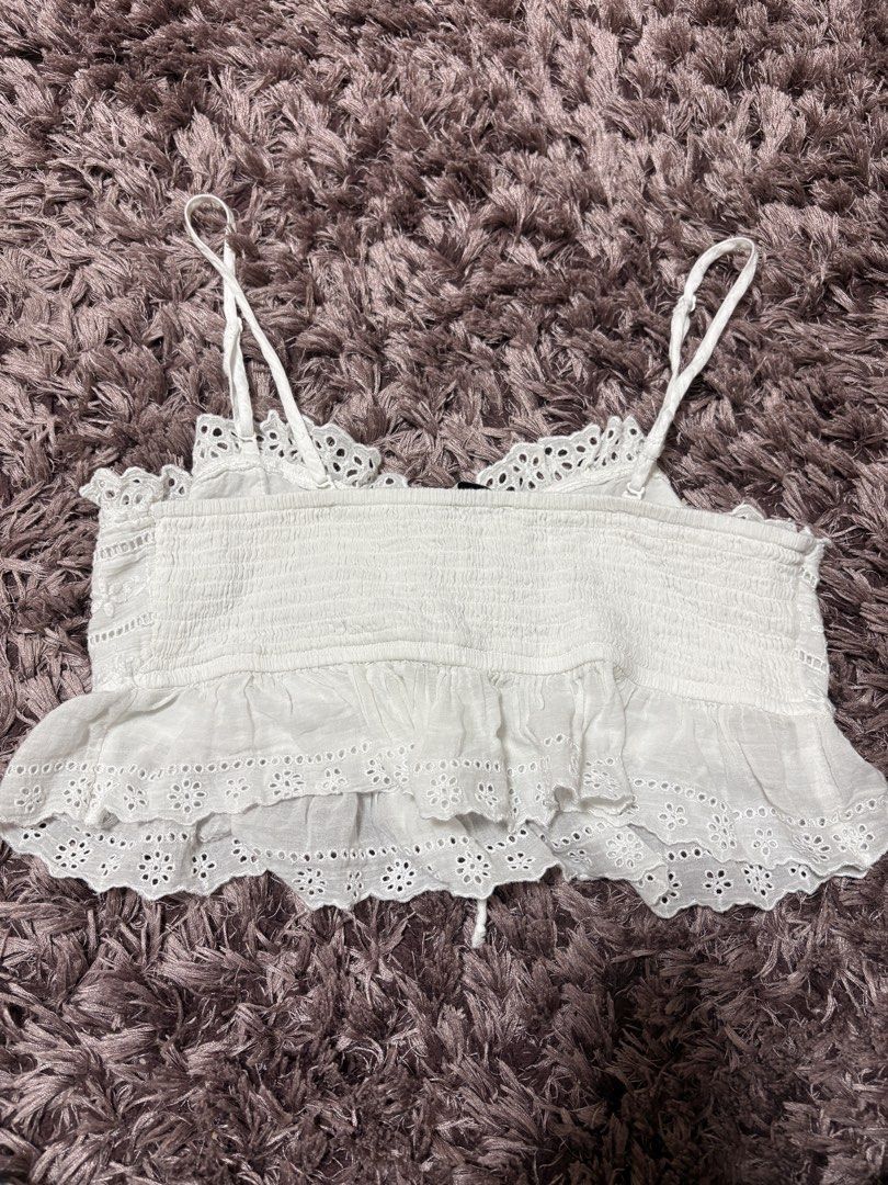 BNWOT American Eagle White Eyelet Tie Top (Category: Sleeveless) located in Quezon City. Submitted by jjccly (Listing ID 1445739564, Image 2). Description: bnwot bought in american eagle store in sm aura - just tried on once size small on tag no flaws/issues no ww *detachable straps! can be worn as a tube.