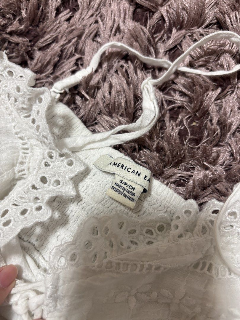 BNWOT American Eagle White Eyelet Tie Top (Category: Sleeveless) located in Quezon City. Submitted by jjccly (Listing ID 1445739564, Image 3). Description: bnwot bought in american eagle store in sm aura - just tried on once size small on tag no flaws/issues no ww *detachable straps! can be worn as a tube.