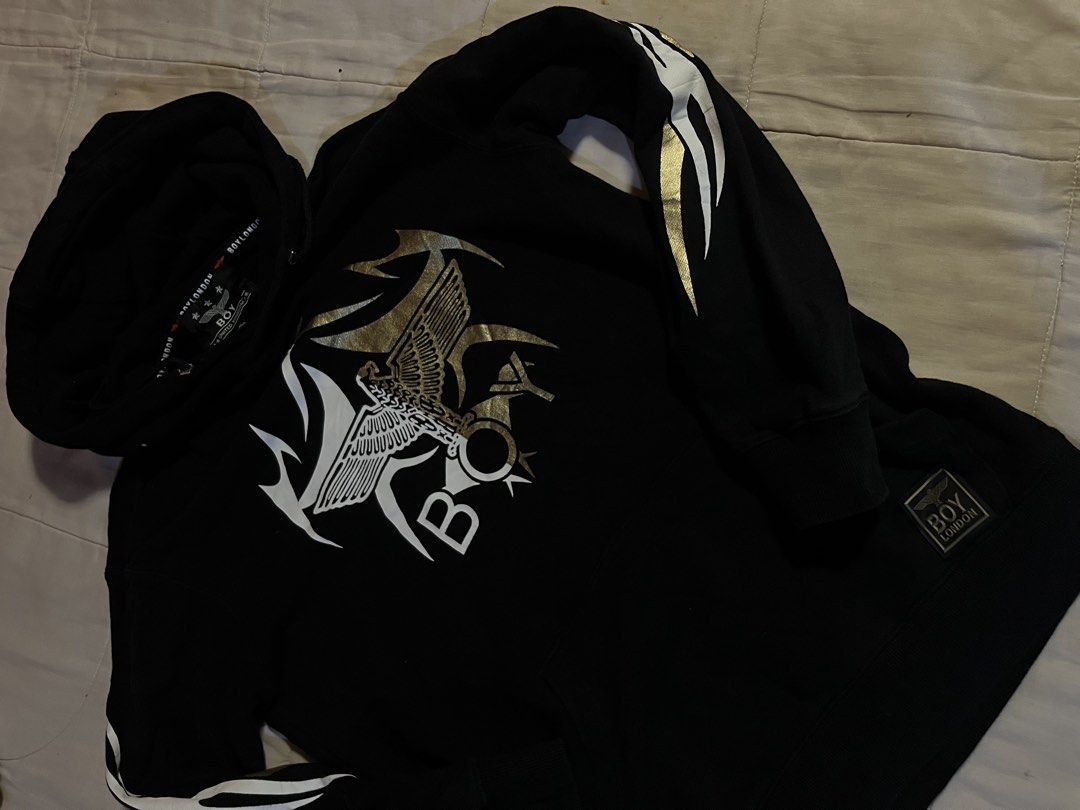 BOY London Black Eagle Graphic Hoodie (Category: Hoodies) located in Santa Rosa. Submitted by shoplikem_ (Listing ID 1445733216, Image 2). Description: OG SIZE: LARGE - Black BOY London hoodie - Iconic eagle graphic on front - Graphic detail on sleeves - Front pocket - Hooded design - Tagged size M.