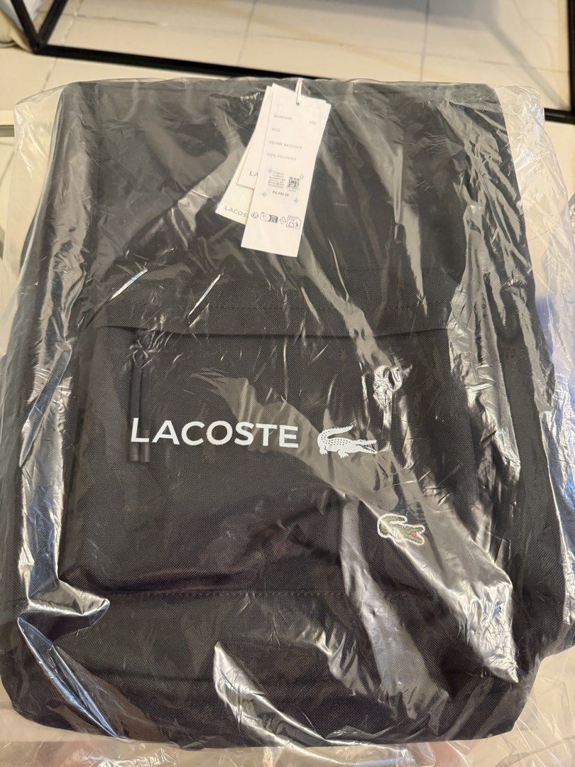 Brand new authentic Lacoste Square Backpack in Black (Noir). (Category: Backpacks) located in Pasig City. Submitted by angeltulod (Listing ID 1445714550, Image 2). Description: FOR SALE: Authentic Lacoste Square Backpack (NU4598NE) 🎒 ✅ Model: NU4598NE ✅ Color: Noir (Black) ✅ 100% Polyester ✅ Brand New with Tags ✅ Includes Original Packaging ✅ Stylish minimalist design ✅ Ideal for work, school, travel, and everyday use .