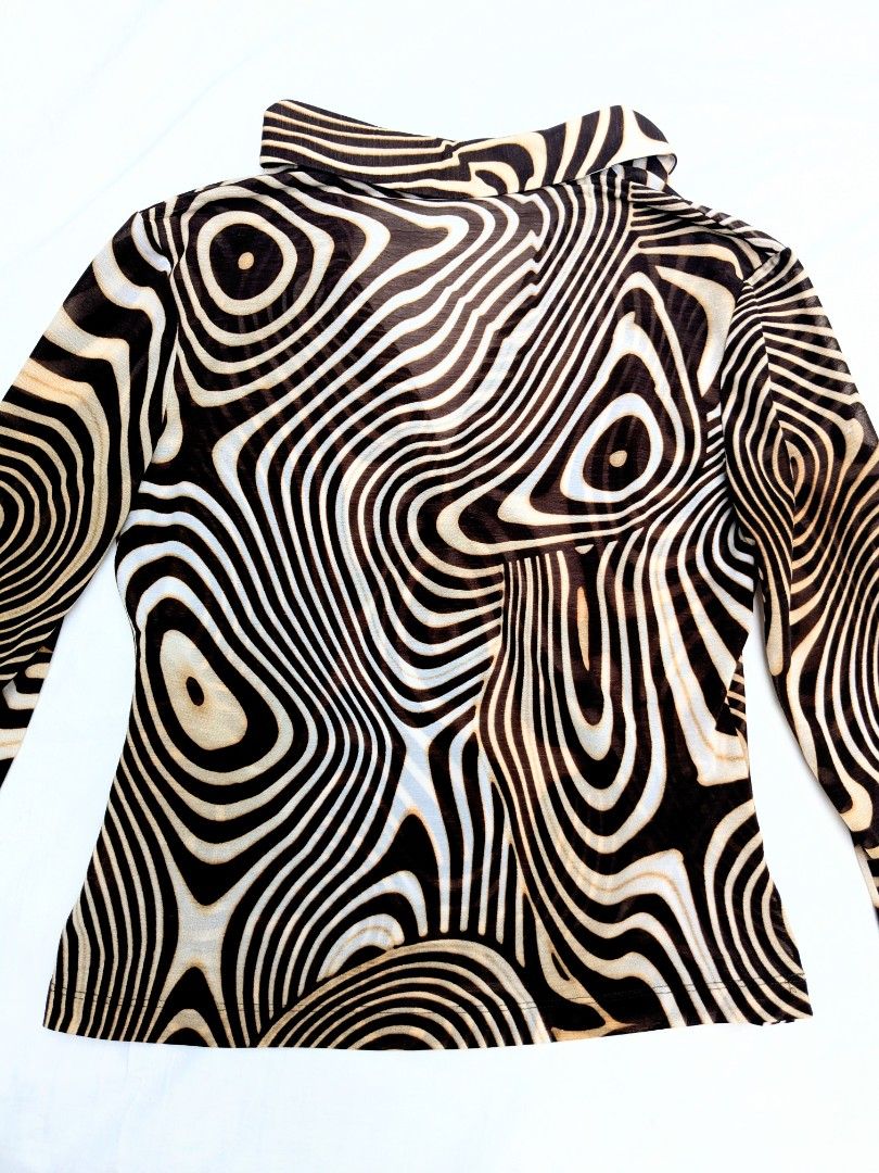 Brown Mesh Psychedelic Pattern Long sleeve (Category: Longsleeves) located in Las Pinas. Submitted by amisells (Listing ID 1445698927, Image 3). Description: Size: L 48.5cm W 42 B 84 sleeve length 56 photo reference at the end! used only once note that the garment is measured while lying flat, there may be a 1-3cm margin of error..