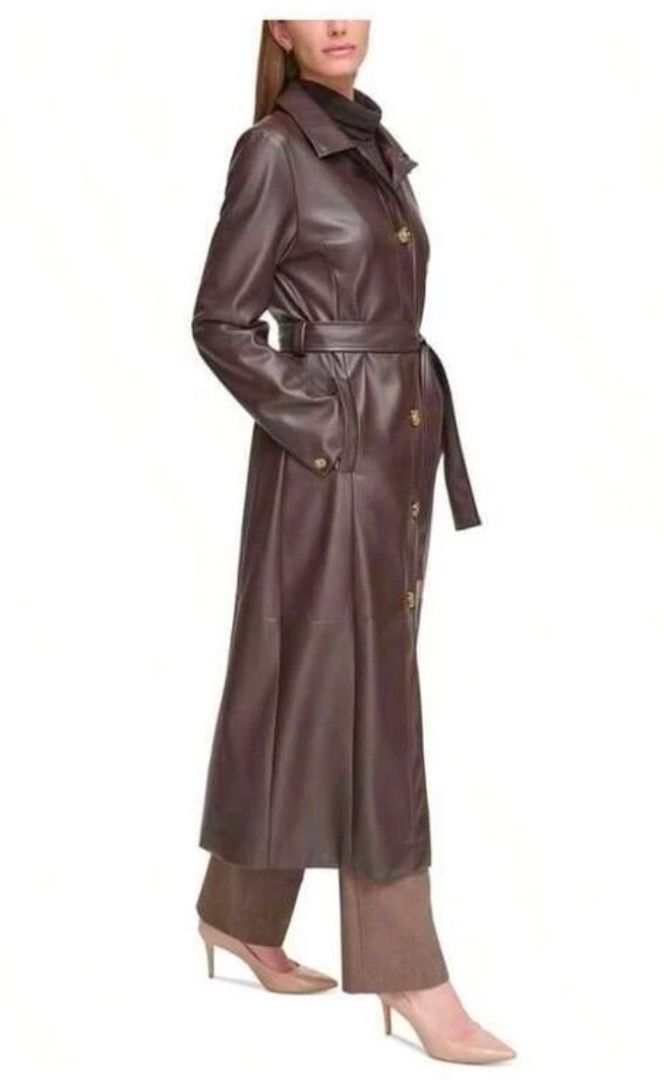 Brown Leather Trench Coat with Belt (Category: Coats, Jackets and Outerwear) located in Quezon City. Submitted by shinereign (Listing ID 1445635795, Image 2). Description: - Long brown leather trench coat - Includes matching belt for a cinched waist - Features a classic collar and button-up front - Versatile styling: dress up or down - Ideal for cooler weather - Made from great quality leather.