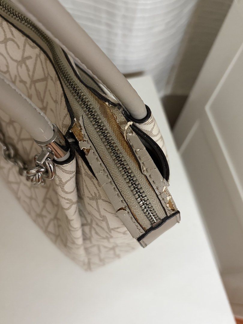 Calvin Klein Shoulder/ Office Bag (Category: Shoulder Bags) located in Antipolo. Submitted by 210user (Listing ID 1445761138, Image 3). Description: READ - see photos for flaws - aside from the chipping leather, zippers and handle are still in a good condition • no return and refund • payment first policy message me for inquiries! payment: gcash delivery: sdd .