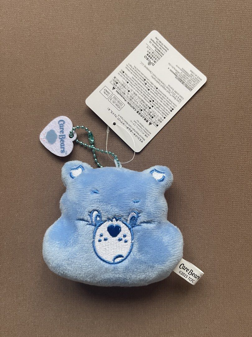 Care Bears Blue Bear Plush Keychain with Tag (Category: Plushies & Soft Toys) located in Manila. Submitted by shopandscore (Listing ID 1445688230, Image 1). Description: - Adorable blue Care Bear plush keychain - Original tag still attached - Small size, ideal for decorating bags or keys - Made with soft, huggable material - Part of the beloved Care Bears collection - Manufactured in China.