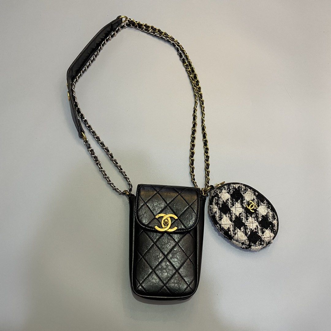 Chanel Exclusive Novelty Shoulder Bag (Category: Luxury Bags & Wallets) located in Baguio. Submitted by 2ndstory.vntg (Listing ID 1445737372, Image 2). Description: CHANEL EXCLUSIVE NOVELTY SHOULDER BAG✨ Authentic💯 Pouch: Black quilted material with a gold interlocking CC clasp. Purse: Tweed coin pouch attached to a gold and silver interwoven chain. Strap: Black leather strap with gold "CHANEL" lettering. 🏷️₱2,000 — free shipping! 📍Baguio City