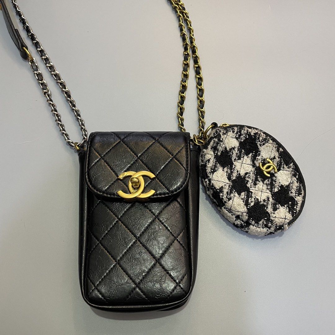 Chanel Exclusive Novelty Shoulder Bag (Category: Luxury Bags & Wallets) located in Baguio. Submitted by 2ndstory.vntg (Listing ID 1445737372, Image 3). Description: CHANEL EXCLUSIVE NOVELTY SHOULDER BAG✨ Authentic💯 Pouch: Black quilted material with a gold interlocking CC clasp. Purse: Tweed coin pouch attached to a gold and silver interwoven chain. Strap: Black leather strap with gold "CHANEL" lettering. 🏷️₱2,000 — free shipping! 📍Baguio City