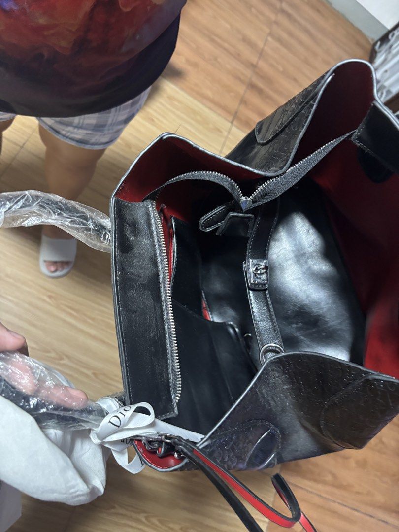 Christian Dior Black Monogram Tote Bag (Category: Luxury Bags & Wallets) located in Manila. Submitted by klatine (Listing ID 1445714730, Image 3). Description: - RFS: bag's kinda heavy on it's own - comes with strap - never used - still with dust bag - Loc: Rodriguez Rizal.