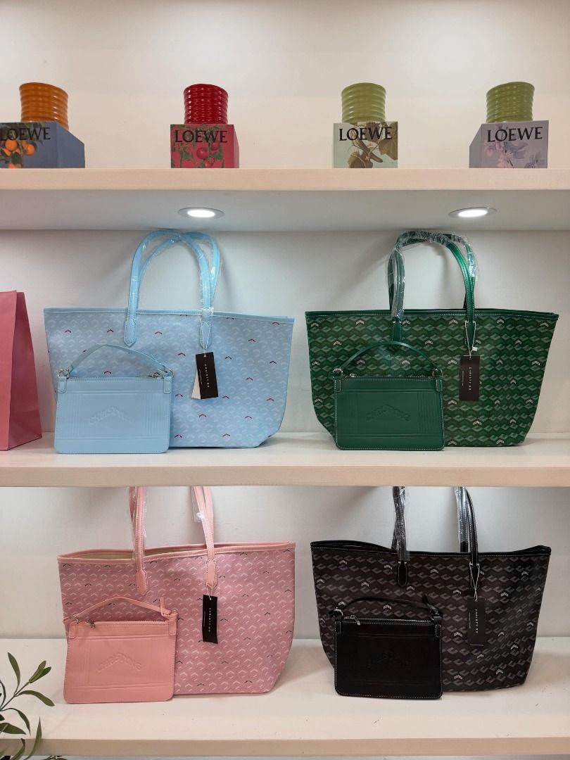 Christy Ng Tote Bag with Pouch - Multiple Colors (Category: Tote Bags) located in Baguio. Submitted by ayreesh_meyyy (Listing ID 1445691112, Image 2). Description: - Set includes Christy Ng tote bag and matching pouch. - Available colors: Pink, Light Blue, Dark Green, Black. - Ideal for everyday use and travel. - Get yours now!.