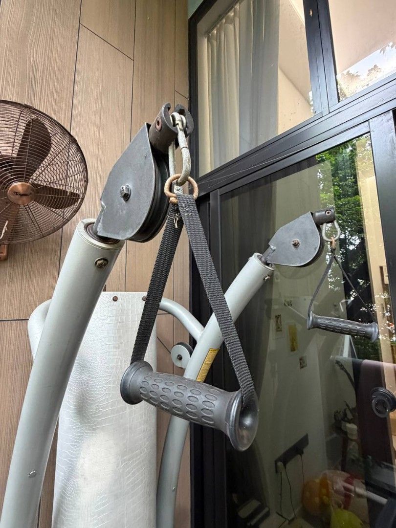 Compact Cable Machine (Category: Cardio & Fitness Machines) located in Singapore. Submitted by llnd (Listing ID 1445725767, Image 6). Description: Weighted cable machine good for home workout regimes that need all-in-one cable solutions. Bought this machine off a physiotherapy company that used it for weights training and physiotherapy recovery. I am selling due to moving house otherwise would continue using. All cables are still really smooth an