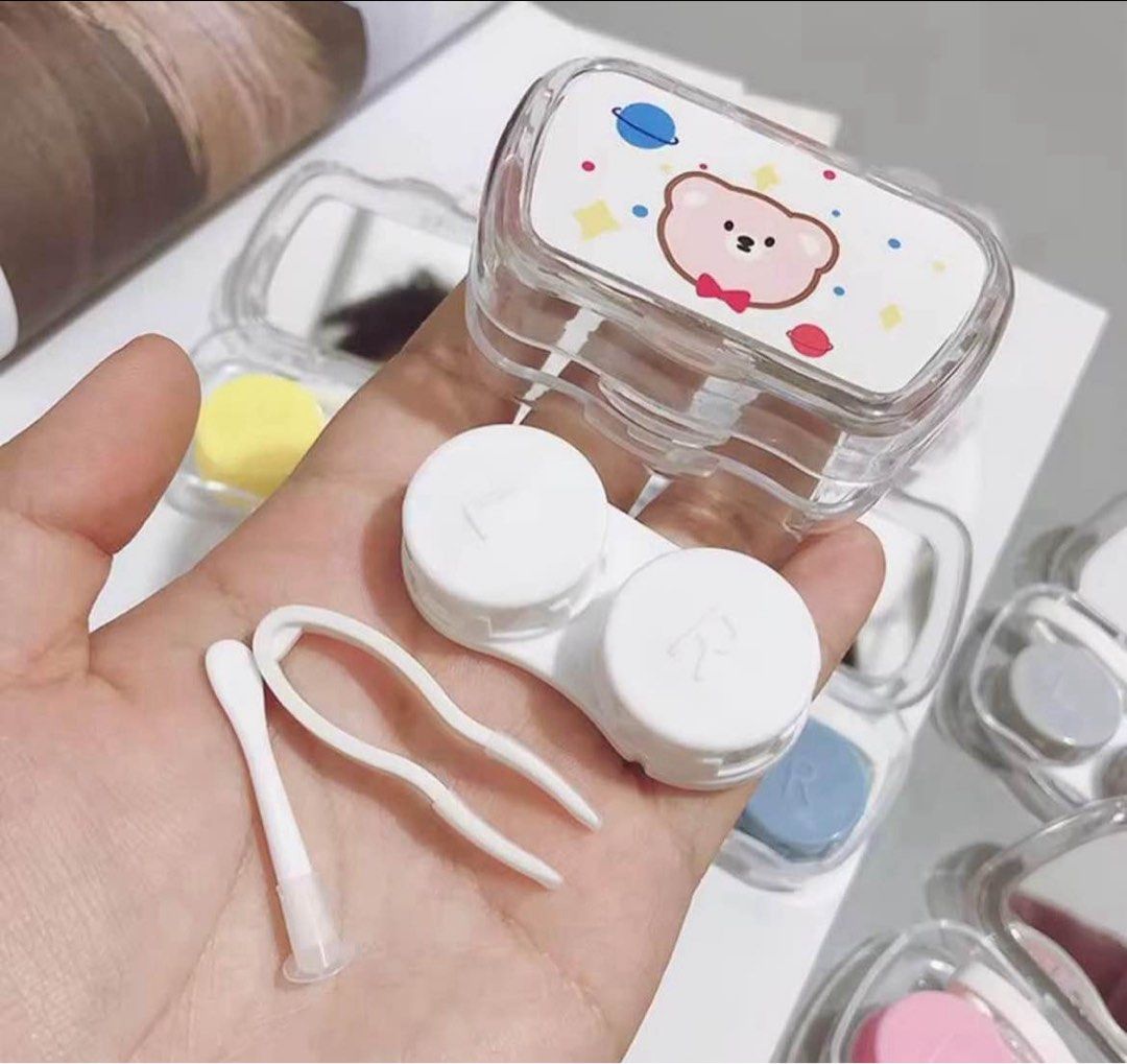 Contact Lens Case Portable Travel Kit (Category: Vision Care) located in Taguig. Submitted by mihox (Listing ID 1445674855, Image 3). Description: Size: 5*8*3cm it comes with tweezer, applicator, contact lens case, and luggage with mirror. The material is environmentally friendly, small and suitable to be placed in the bag, which can protect your contact lenses very well..