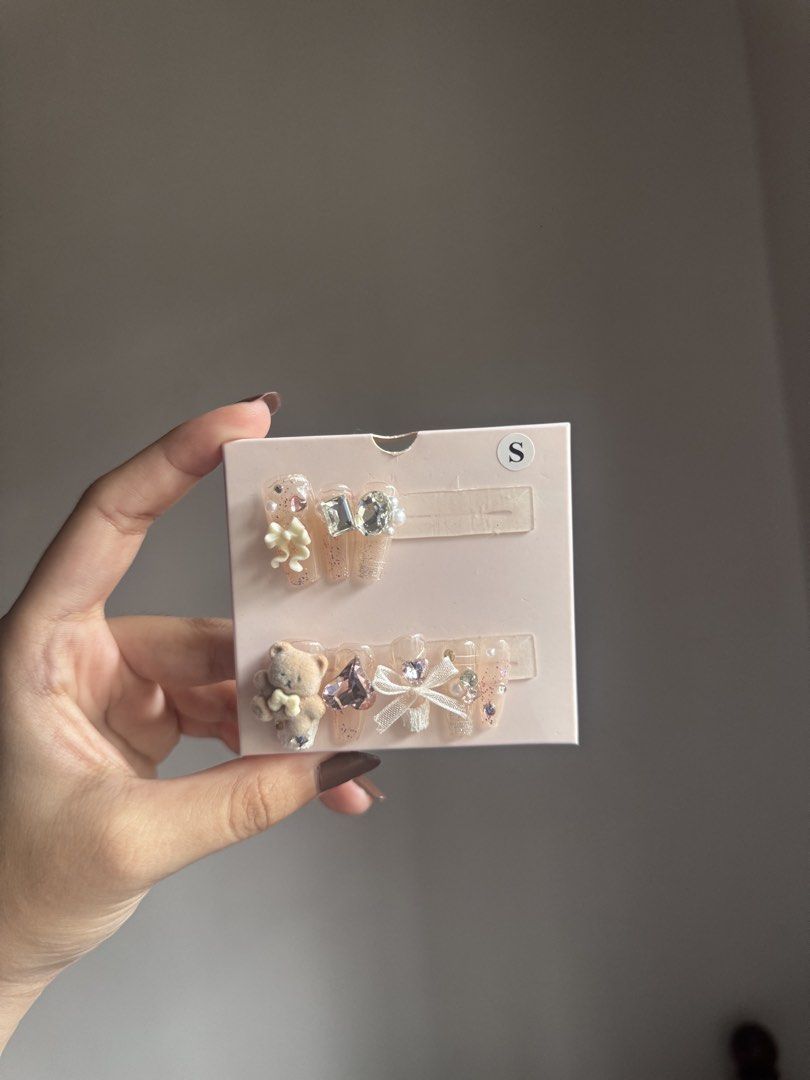 Coquette Press-On Nails (Category: Hands & Nails) located in Manila. Submitted by dalayuh (Listing ID 1445663770, Image 3). Description: COQUETTE PRESS ON NAILS (missing 2 nails) ➶ Selling for ₱90 originally bought for ₱200+ at The Colorist ➶ Comes with box ➶ Nail charms can still be used ╰── ──╮ ⋆˙⟡ Location : Taguig City, Manila ⋆˙⟡ MOP is thru GCash only ⋆˙⟡ Need proof of payment before sending out the item ⟡Send a DM if you want more pics⟡ .
