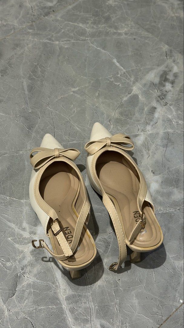 Cream Slingback Heels with Bow Detail (Category: Heels) located in Manila. Submitted by meianhey (Listing ID 1445736779, Image 2). Description: - Cute cream slingback heels - Pointed toe with a decorative bow - Adjustable strap at the back - Low heel, perfect for comfortable walking - Size: 41 - no box included.