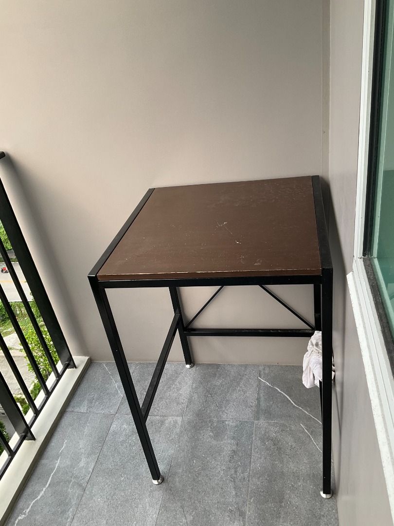 Custom-built Industrial Style Table with Metal Frame (Category: Tables & Sets) located in Caloocan City. Submitted by nicholass69897 (Listing ID 1445665917, Image 2). Description: Custom-built Industrial Style Table with Metal Frame - Size: 62 cm (L) x 60 cm (W) x 90 cm (H) - Has adjustable feet - Wood top (chipped) and metal frame - Can be a bar table or a kitchen rack location: Ortigas, Pasig.