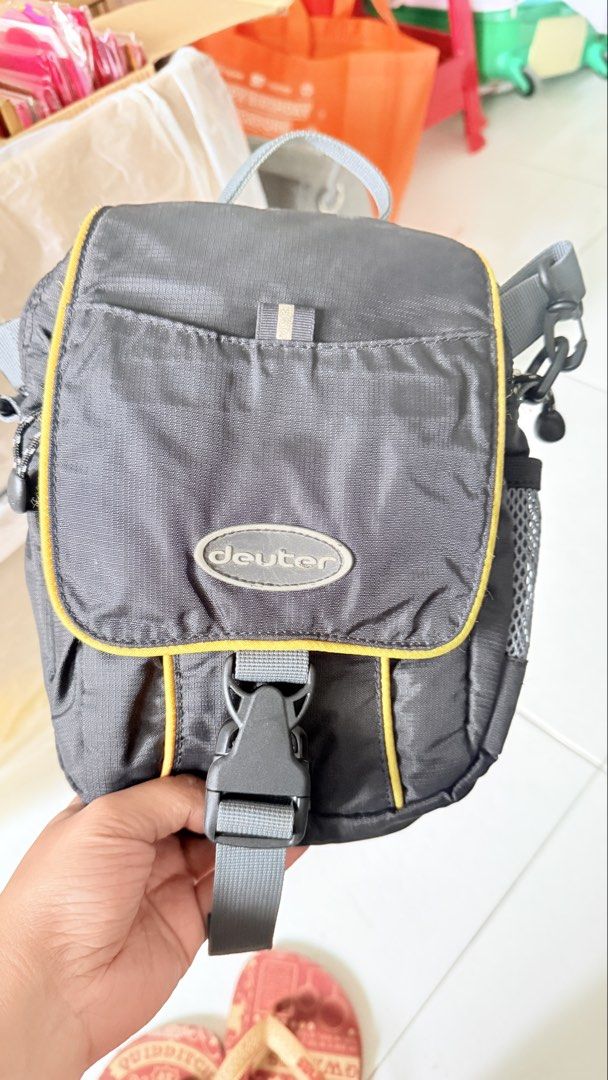Deuter Grey Yellow Trim Sling Bag (Category: Backpacks) located in San Pablo. Submitted by dtanne (Listing ID 1445757573, Image 1). Description: - Deuter bag in grey with yellow trim. - Front pocket with secure buckle closure. - Convenient side mesh pocket. - Adjustable strap for a comfortable fit. - Ideal for carrying your small essentials. Arriving in PH: last week of July Pay first for reservation.