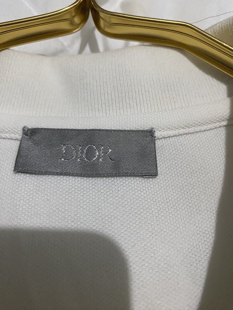 Dior Homme Bee Polo Shirt (Category: Tshirts & Polo Shirts ) located in Cavite. Submitted by JandyLou (Listing ID 1445693041, Image 3). Description: Carousel Listings Title:Dior Icon White Polo Shirts Size: Small to Medium Mens Condition: Like New (Color may vary due to lighting) Price: Php 3,500 Flaws: No flaws, needs wash only. Payment Methods: Payment first via Gcash Delivery Options (shoulder by buyer): Lalamove, Lbc or J&T delivery. NO CANCE