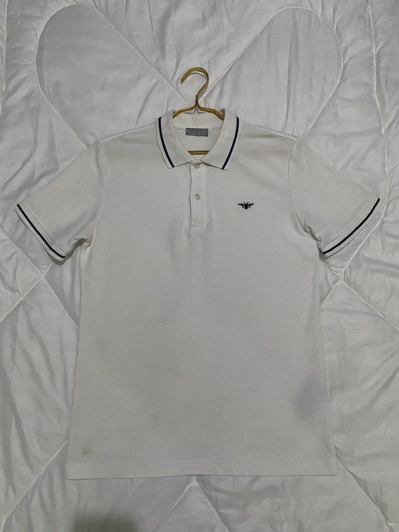 Dior Homme Bee Polo Shirt (Category: Tshirts & Polo Shirts ) located in Cavite. Submitted by JandyLou (Listing ID 1445693041, Image 1). Description: Carousel Listings Title:Dior Icon White Polo Shirts Size: Small to Medium Mens Condition: Like New (Color may vary due to lighting) Price: Php 3,500 Flaws: No flaws, needs wash only. Payment Methods: Payment first via Gcash Delivery Options (shoulder by buyer): Lalamove, Lbc or J&T delivery. NO CANCE