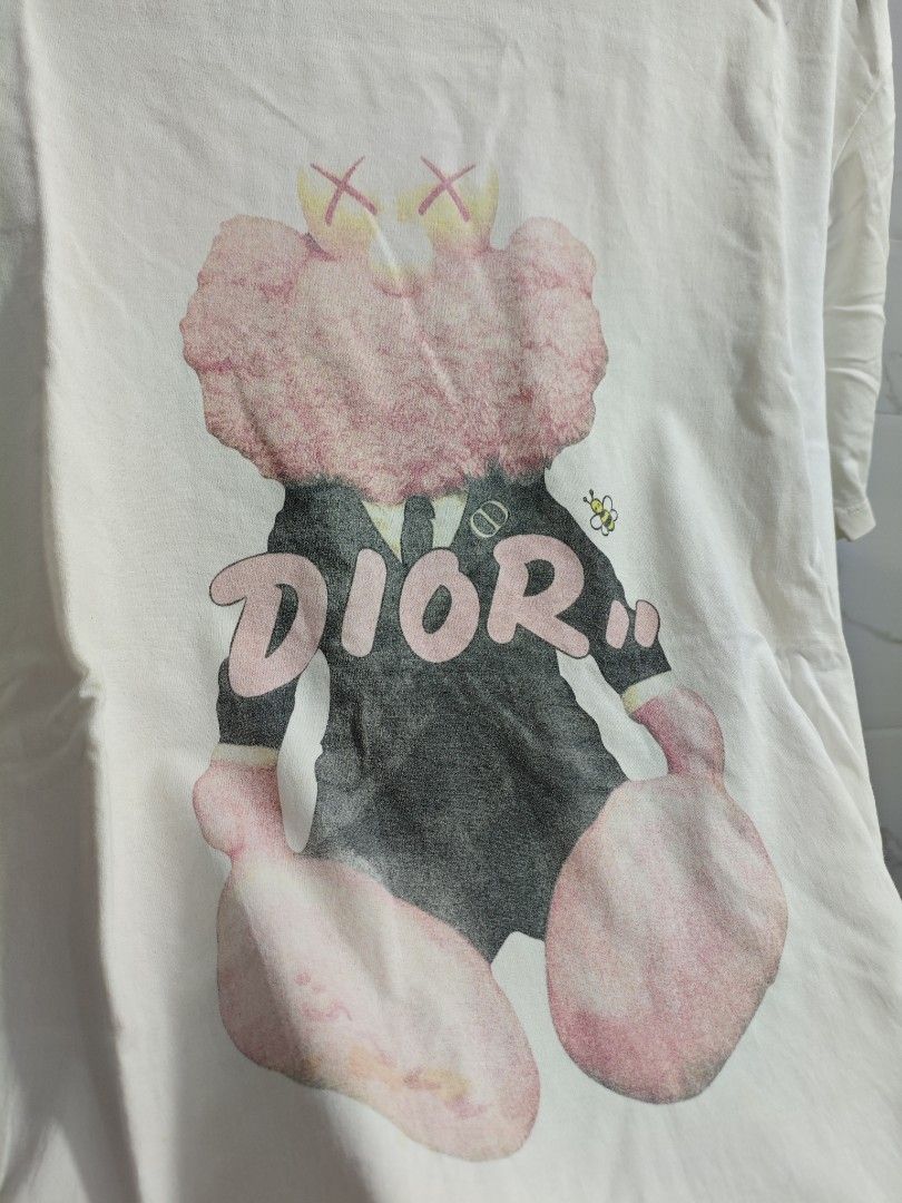Dior Kaws Classic Unisex Tshirt (Category: Everything Else Others) located in Baguio. Submitted by jayjay_apparel01 (Listing ID 1445654760, Image 3). Description: Dior Kaws Classic Unisex Tshirt Color Rate 9/10 Print Rate 8/10 Complete Tags Cotton Tela Need Wash Size Large To XL Dimes 21 Width 27 Length Price P189.