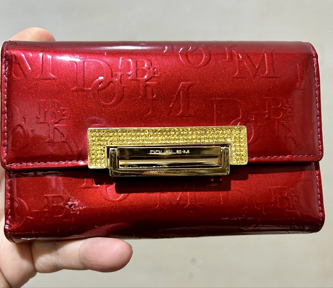 DOUBLE-M Red Patent Leather Embossed Logo Wallet (Category: Wallets & Card holders) located in Quezon City. Submitted by asiaco (Listing ID 1445667389, Image 1). Description: Chic red patent leather wallet with embossed DOUBLE-M logo and sparkling crystal clasp. Features card slots and coin pouch. Made in Italy. Minor exterior scuffs as shown..