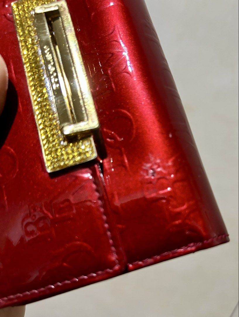 DOUBLE-M Red Patent Leather Embossed Logo Wallet (Category: Wallets & Card holders) located in Quezon City. Submitted by asiaco (Listing ID 1445667389, Image 3). Description: Chic red patent leather wallet with embossed DOUBLE-M logo and sparkling crystal clasp. Features card slots and coin pouch. Made in Italy. Minor exterior scuffs as shown..