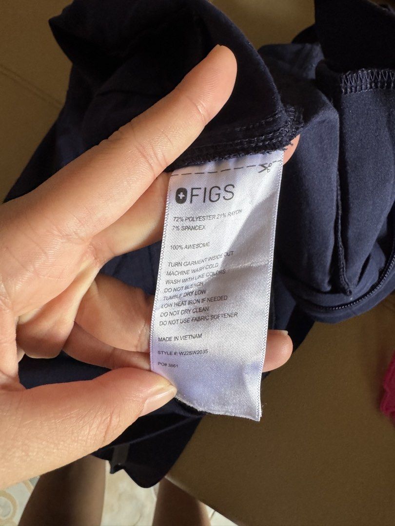 FIGS Rafaela Cargo Scrub Jumpsuit Navy Blue (Category: Jumpsuits) located in Imus. Submitted by mevangkiangco (Listing ID 1445698742, Image 3). Description: - Navy blue FIGS Rafaela Cargo Scrub Jumpsuit - Features multiple pockets - Adjustable drawstring waist for a comfortable fit - Made in Vietnam - Material: 72% Polyester, 21% Rayon, 7% Spandex - SIZE MEDIUM LOCATION: IMUS CAVITEO.