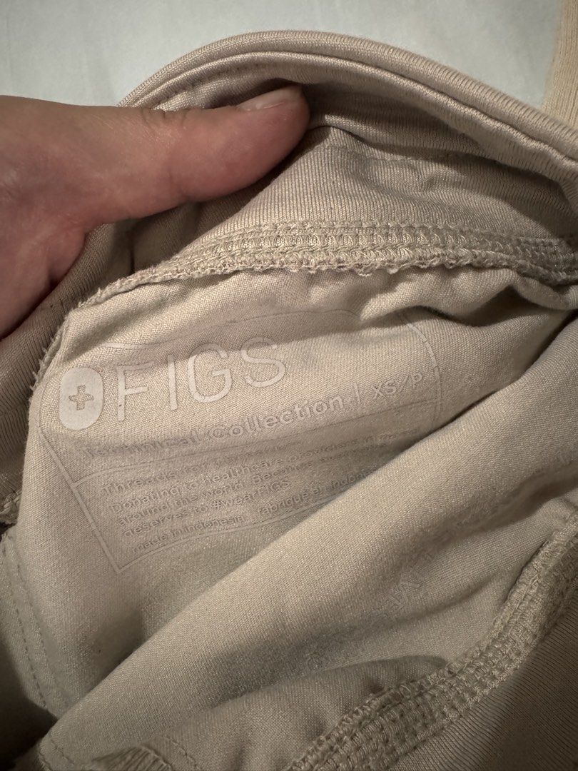 FIGS Zamora High waisted pants in Bone XS/P (Category: Other Bottoms) located in Quezon City. Submitted by essief (Listing ID 1445700043, Image 3). Description: - FIGS jogger scrub pants in color Bone - Size XS/P - Classic cargo pocket with zipper - Red drawstring detail - Comfortable and functional - Ideal for hospital duties! .
