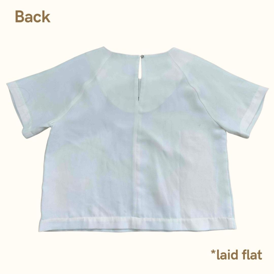 Forever 21 Contemporary White Boxy Blouse (Category: Blouses) located in Cebu City. Submitted by declutterwithciara (Listing ID 1445661121, Image 2). Description: Good condition; Lightly used with a minor flaw. Perfect for smart-casual wear or the office! Size: Medium; but works well for small to large frames! It fits like a standard women's medium (relaxed, breezy fit) Flaw (see 3rd photo) : Has a very small, faint black mark at the front (light