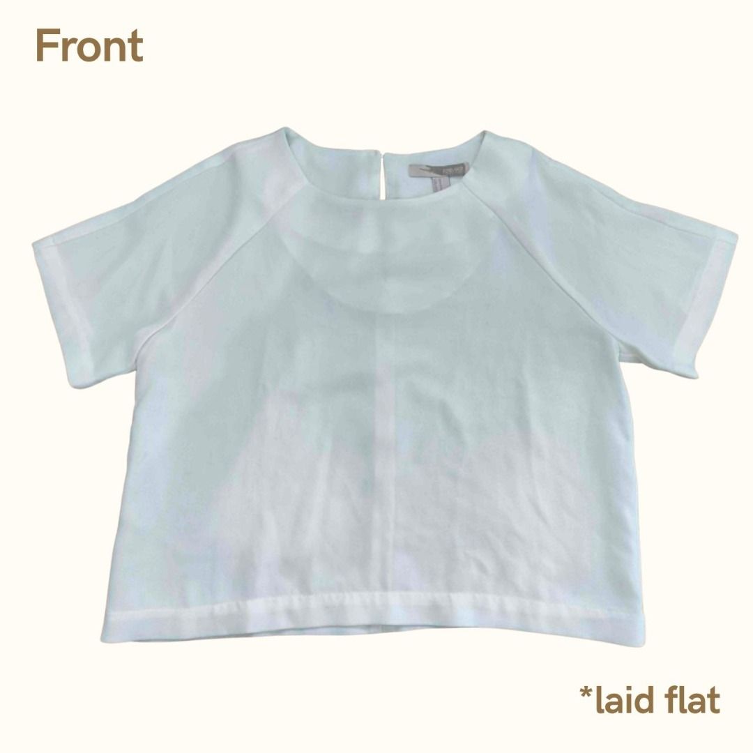 Forever 21 Contemporary White Boxy Blouse (Category: Blouses) located in Cebu City. Submitted by declutterwithciara (Listing ID 1445661121, Image 1). Description: Good condition; Lightly used with a minor flaw. Perfect for smart-casual wear or the office! Size: Medium; but works well for small to large frames! It fits like a standard women's medium (relaxed, breezy fit) Flaw (see 3rd photo) : Has a very small, faint black mark at the front (light
