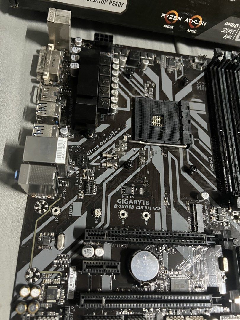 Gigabyte B450M DS3H V2 Motherboard AMD Socket AM4 (Category: Computer Parts) located in Binangonan. Submitted by matthew.299 (Listing ID 1445655125, Image 3). Description: - Gigabyte B450M DS3H V2 Motherboard - Supports AMD Ryzen 5000 Desktop Processors - Socket AM4 - Ultra Durable Design - Includes I/O Shield - Ready for your PC build.