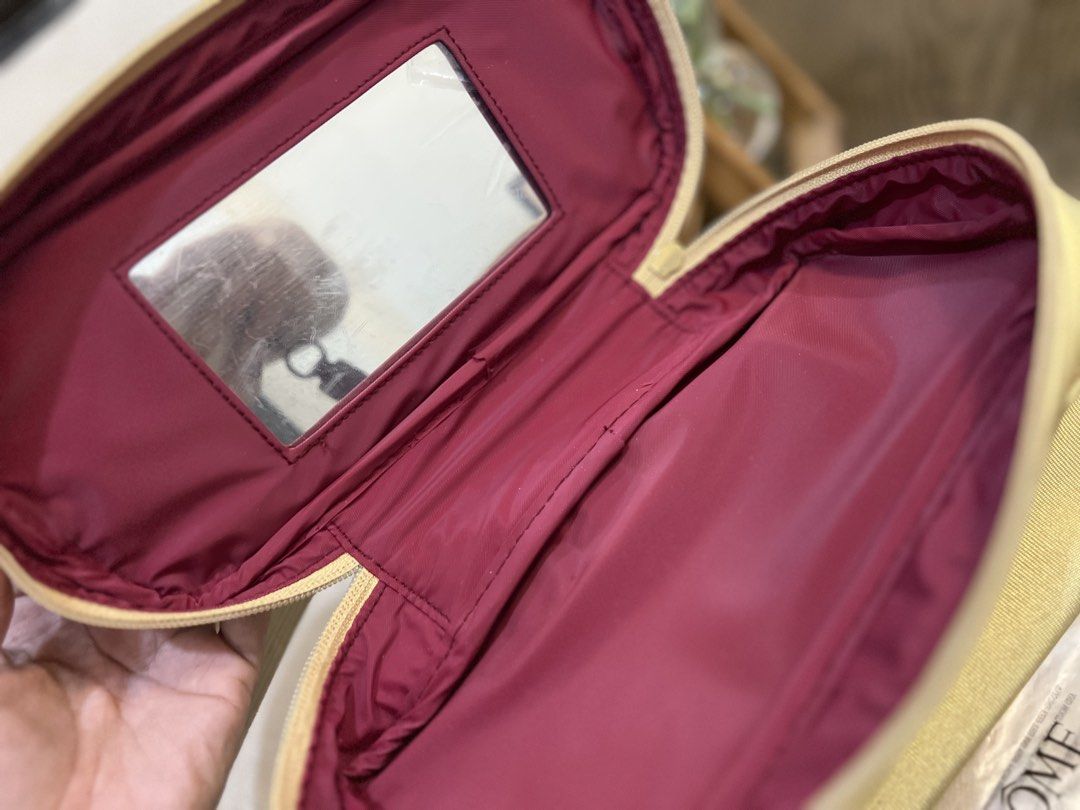 Gold Cosmetic Bag with Mirror (Category: Makeup) located in Quezon City. Submitted by happyshop31 (Listing ID 1445705955, Image 2). Description: - gold cosmetic bag - Features a double zipper closure - Includes an inside mirror and a small pocket - Perfect for travel or everyday use - Helps keep your makeup organized.